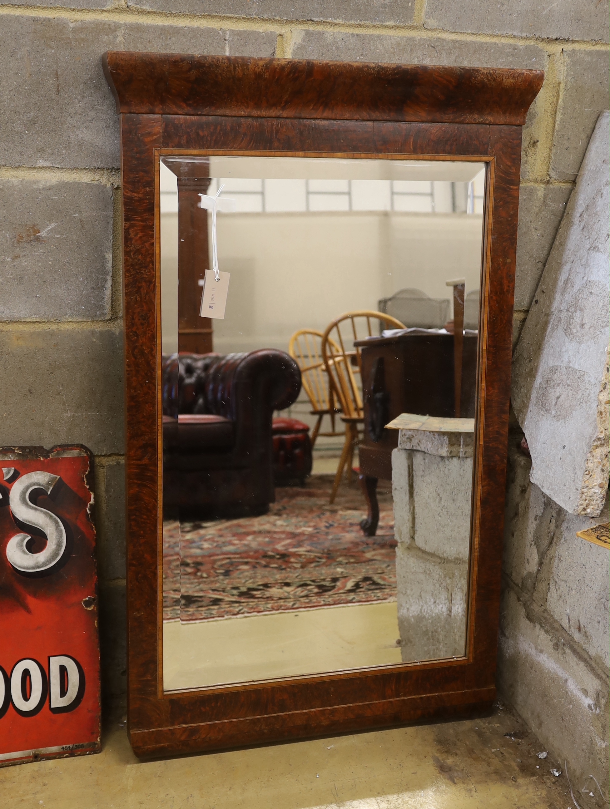 A French Empire style amboyna wall mirror, width 68cm, height 110cm